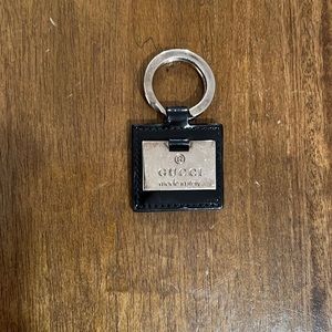 Authentic Gucci vintage black shiny leather key chain. Silver hardware